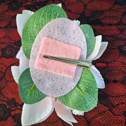 Fleur cheveux tons roses et blancs